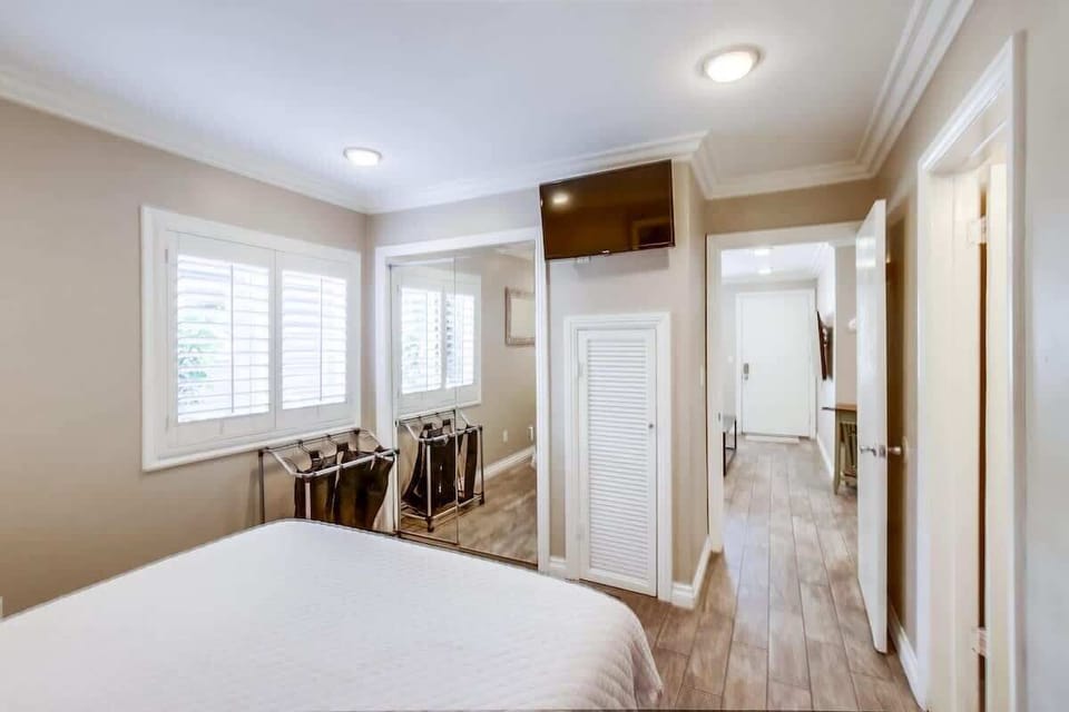 Bedroom (queen bed, TV, attached bathroom)