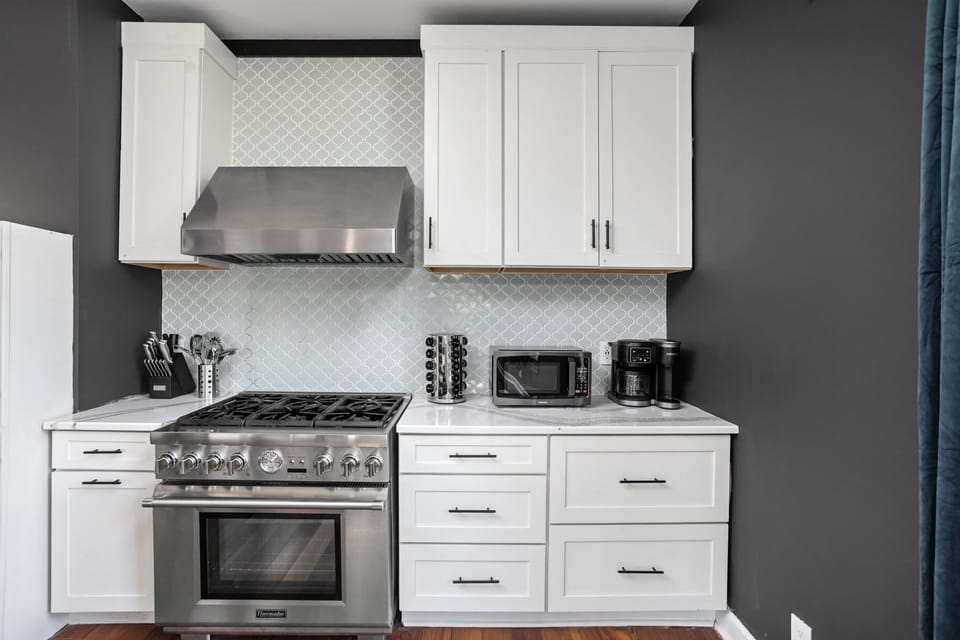 Sleek chef’s kitchen with modern finishes.