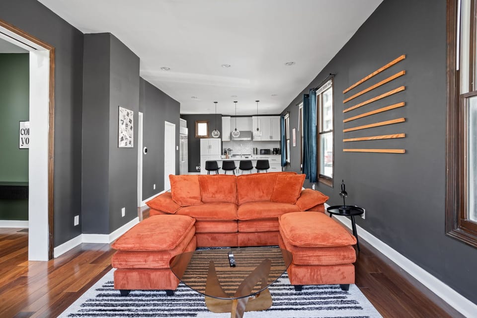 Open-concept living with bold design — lounge in style before heading out to explore Mass Ave.