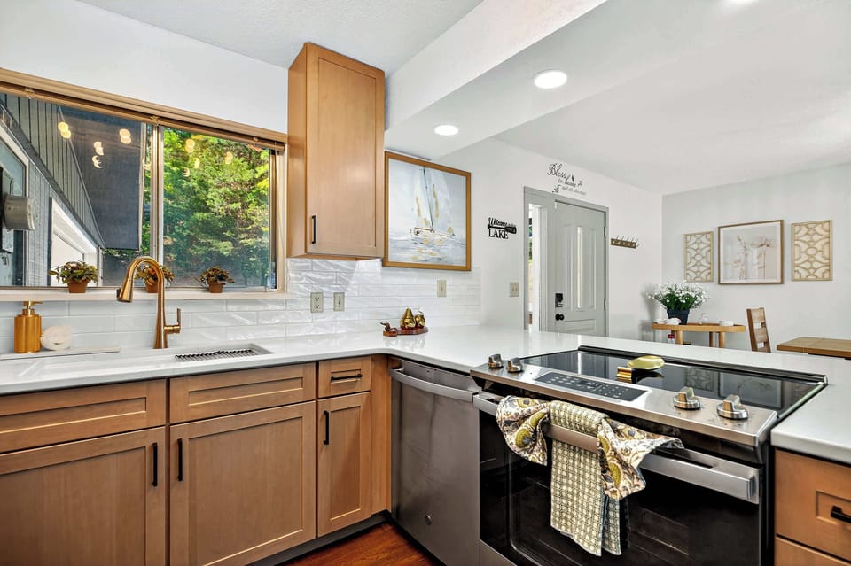 The open kitchen offers ample space & every home comfort​