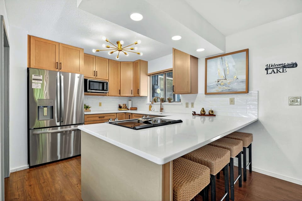 The open kitchen offers ample space & every home comfort​