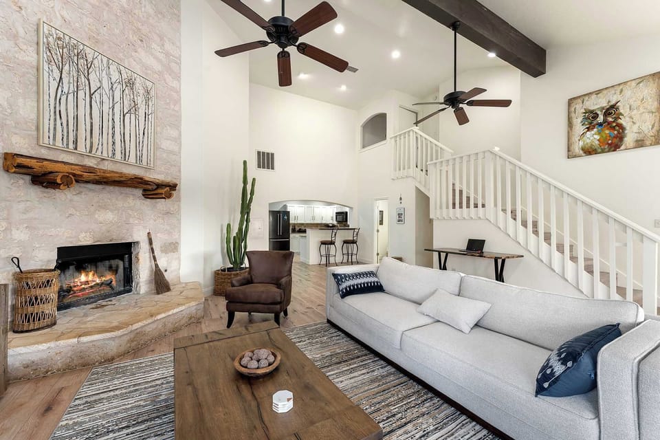 Relax in the open living area with plenty of seating and smart TV
