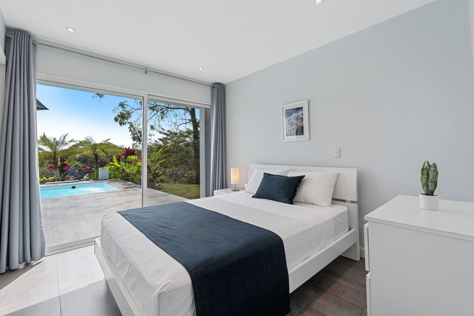This guest room offers direct access to the pool.
