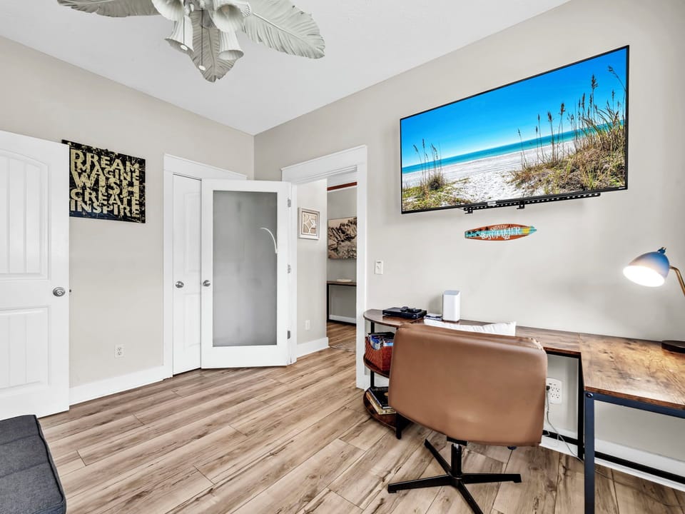 Office with large flat-screen TV