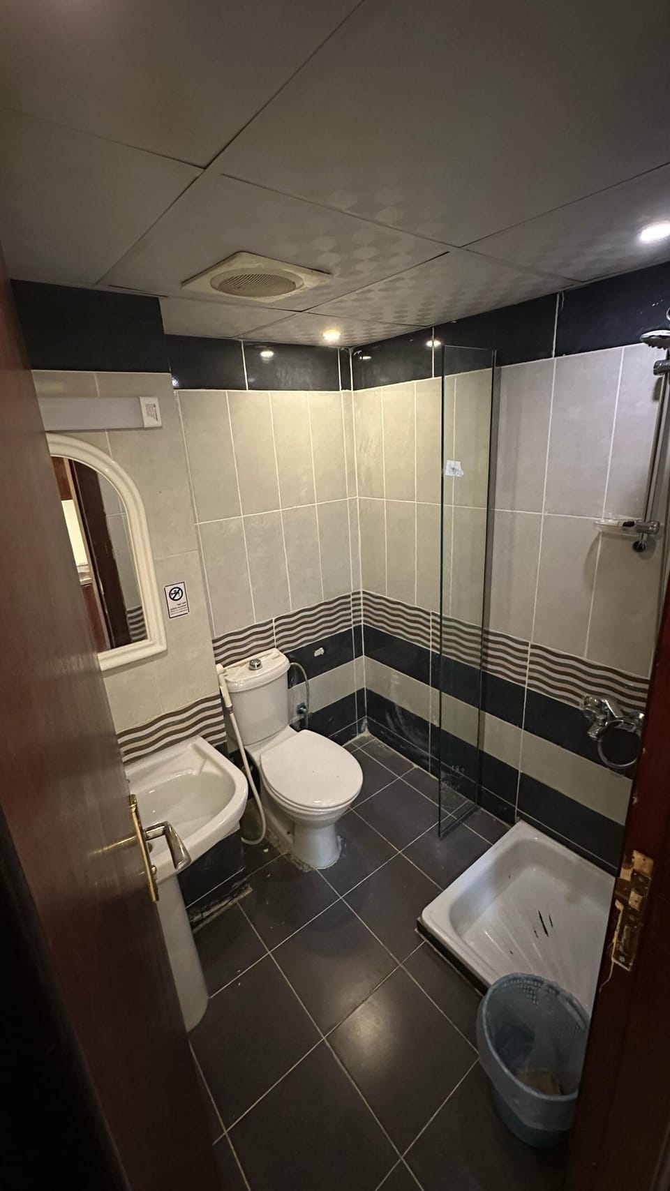Twin Room | Bathroom | Shower, hair dryer, slippers, towels