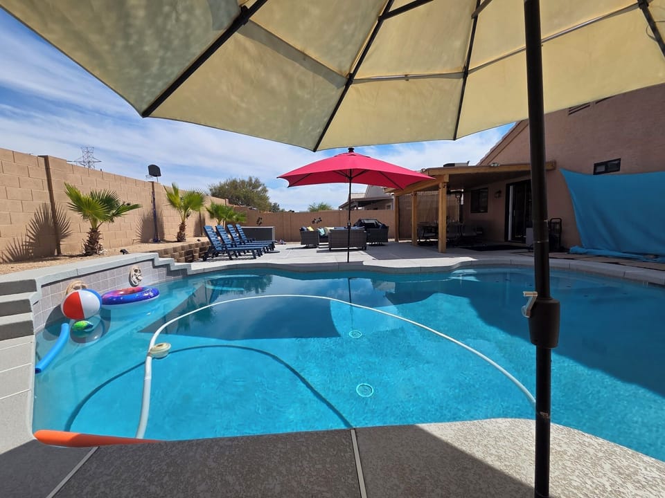 Private heated pool with loungers for relaxing in the Arizona sunshine.