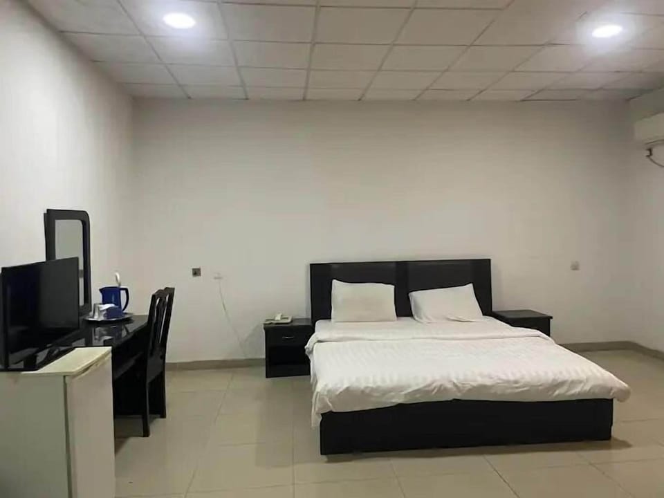 Deluxe Room, Balcony, City View | Desk, laptop workspace, free WiFi