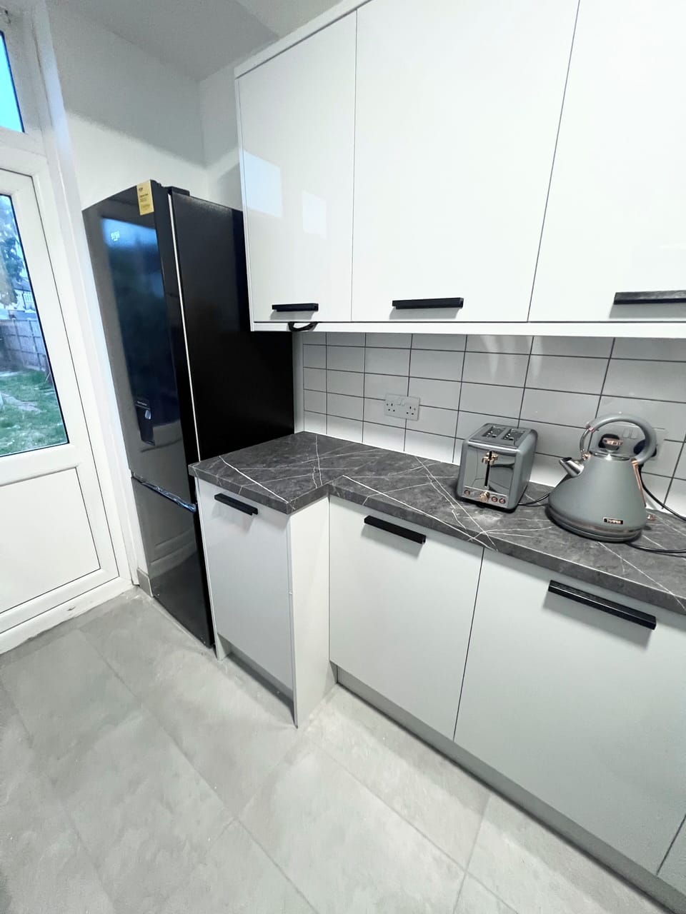 Fully stocked kitchen with toaster,kettle , microwave,oven, fridge/freezer