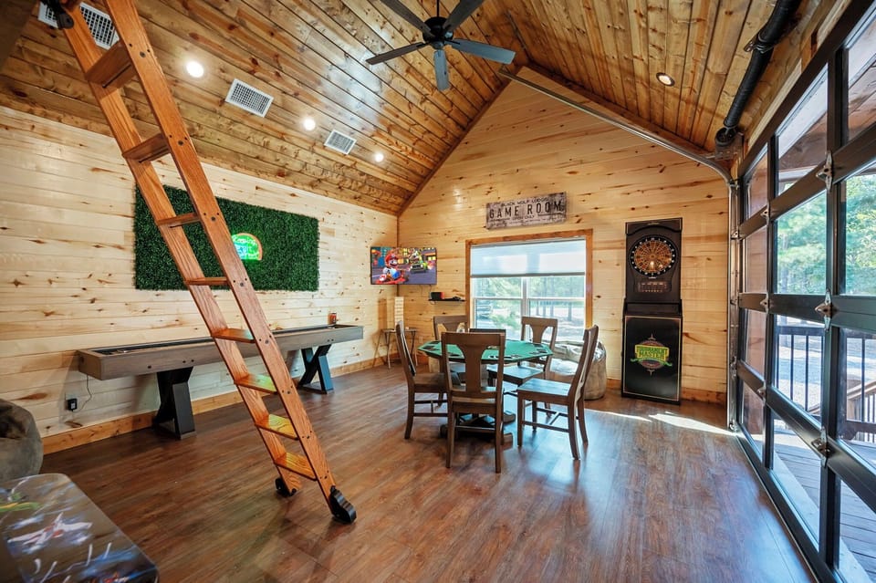 The ultimate game room, with a roll-up garage door to bring the outdoors in.