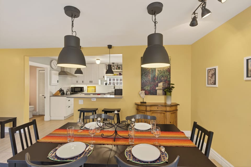 Dining room and extra countertop seating adjacent to kitchen