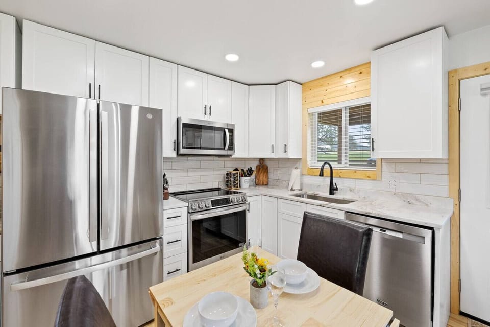 At the heart of the home, this kitchen offers a warm and inviting space to cook, gather, and make lasting memories.