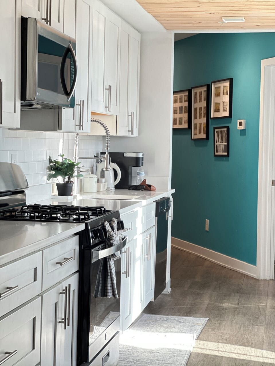 Bright and clean kitchen, fully equipped for effortless home cooking.