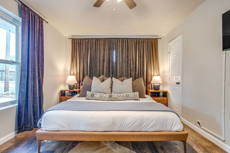 Master bedroom with a plush king bed and peaceful atmosphere for restful nights