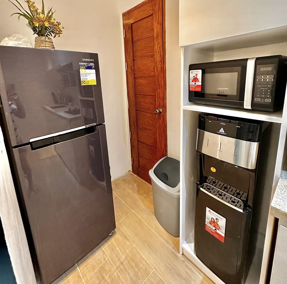 Signature Condo, 2 Bedrooms, City View | Private kitchen | Fridge, microwave, oven, stovetop
