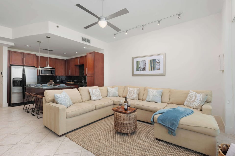 A bright, open living space with soft tones, natural light, and a relaxed flow that feels instantly welcoming. The simple décor and easy layout create a calm, unhurried atmosphere, offering a comfortable place to settle in and enjoy time together.