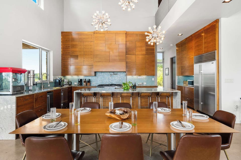 Comfortable dining seats 8, connecting to the kitchen for easy flow