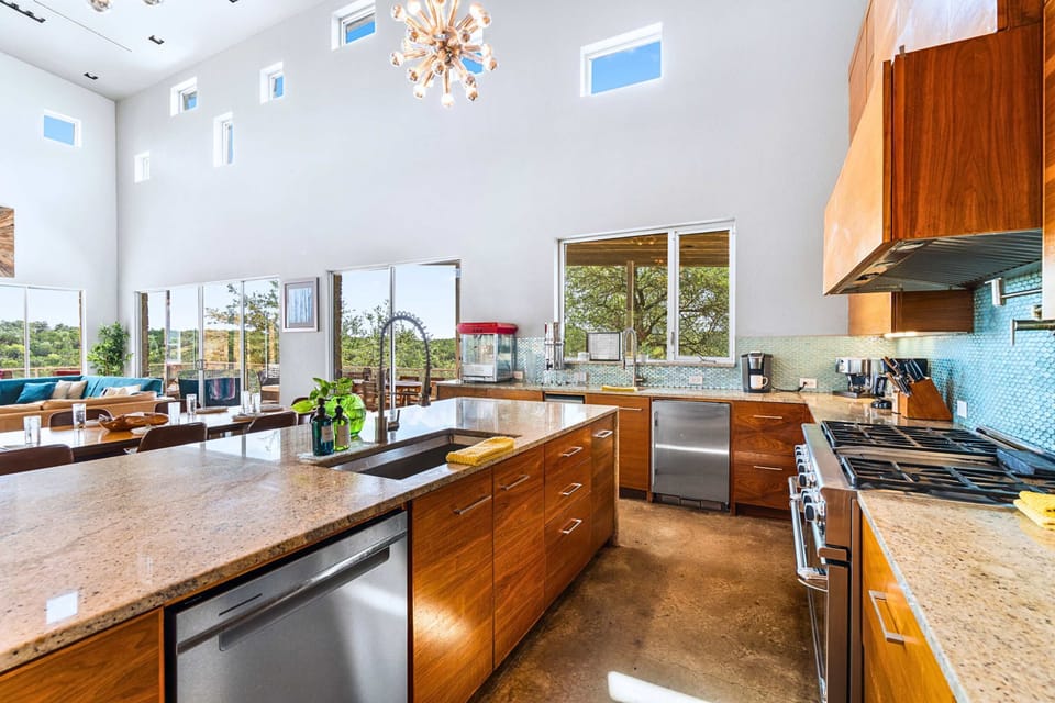 Cook with a view. Premium finishes and expansive counters make meal prep a joy