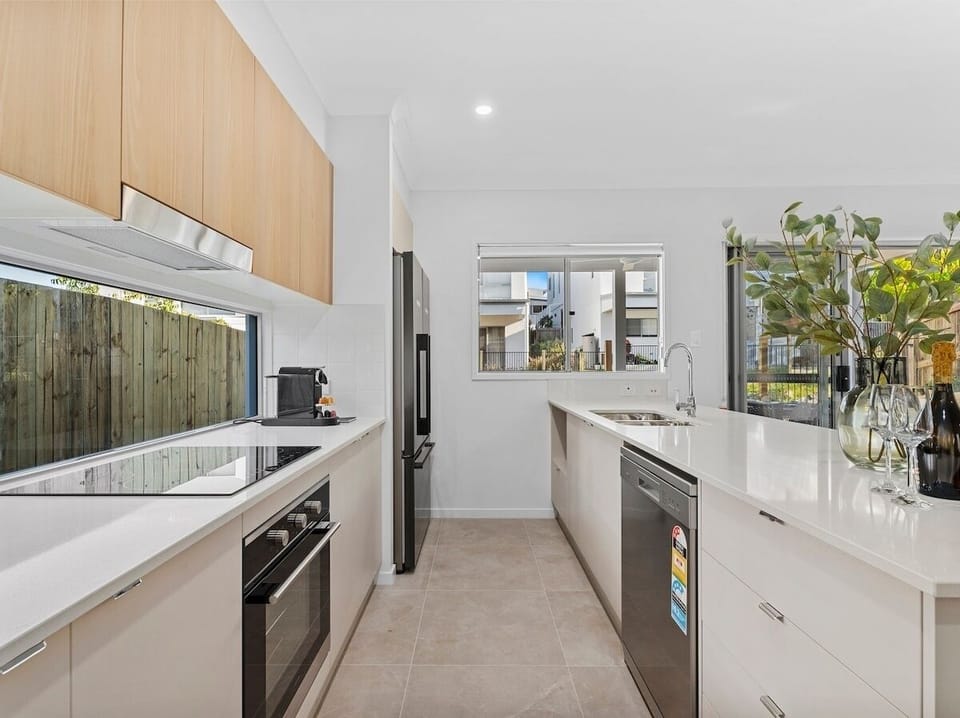 Kitchen with full-size appliances, Nespresso and generous bench space.