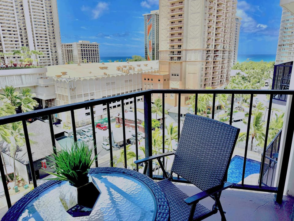 The balcony with chairs and table for ocean view