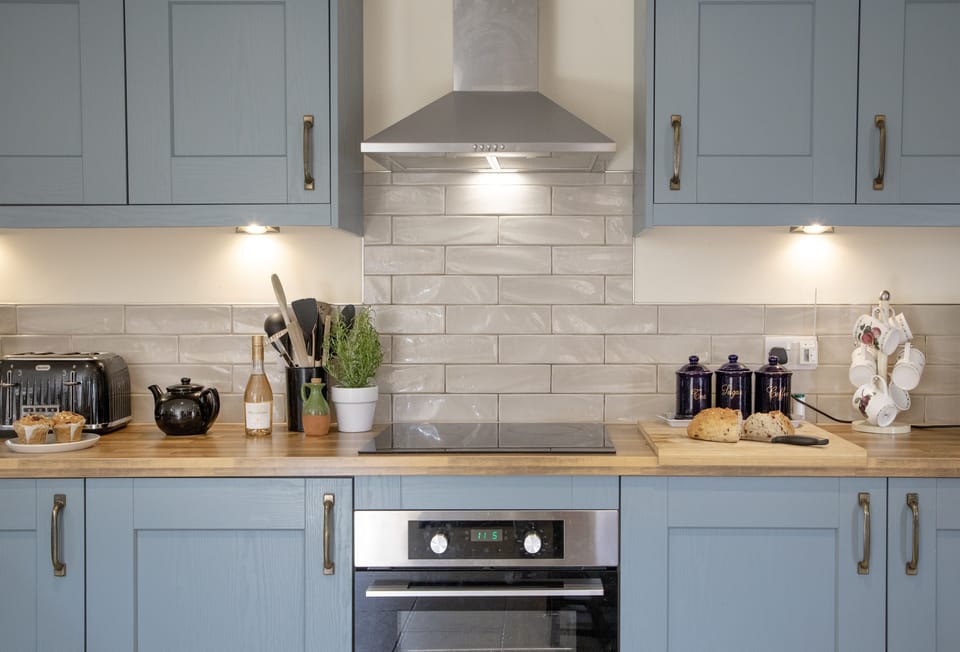 The Old Shippon, near Honiton. Ground floor: Kitchen with  electric oven, hob, microwave, fridge/freezer, dishwasher and washing machine