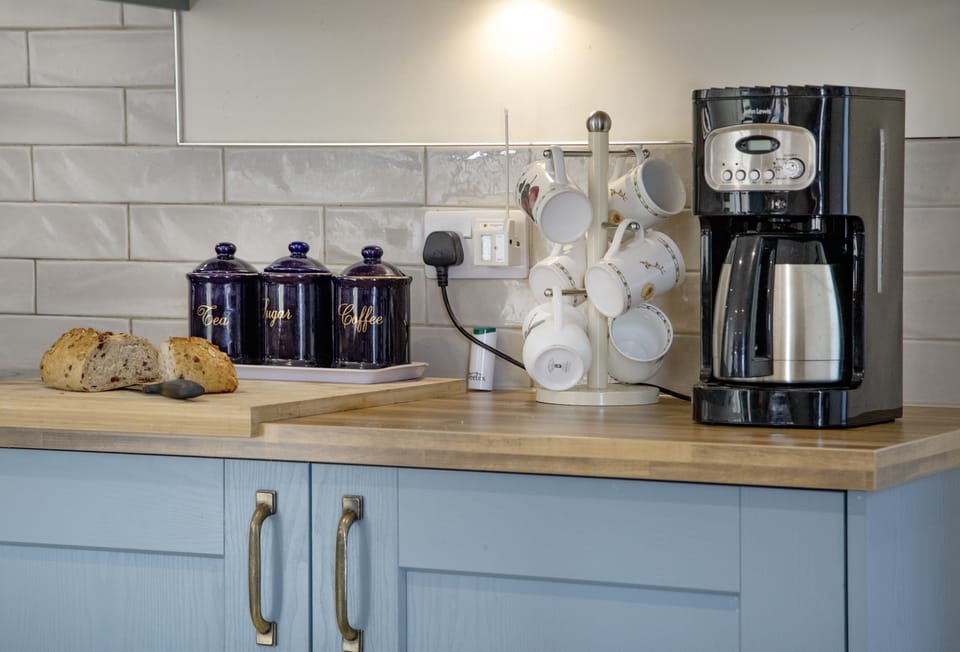 The Old Shippon, near Honiton. Ground floor: Kitchen with  electric oven, hob, microwave, fridge/freezer, dishwasher and washing machine