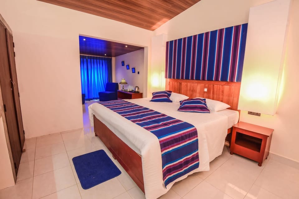 Deluxe Double Room, Hill View | In-room safe, desk, laptop workspace, iron/ironing board