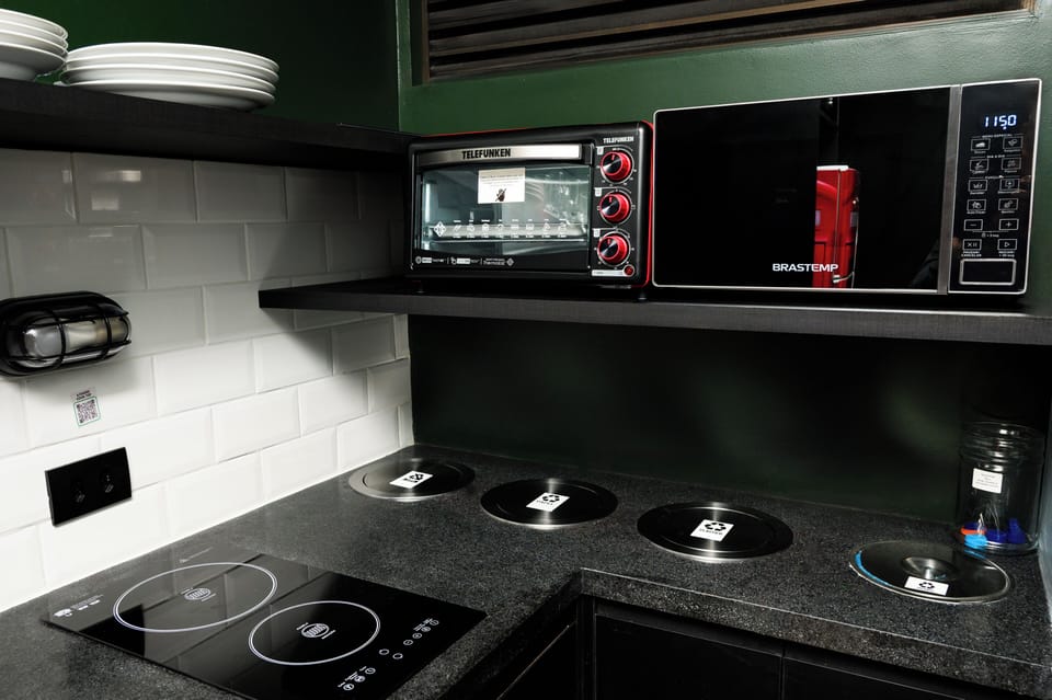Family Studio Suite, Jetted Tub, City View | Private kitchen | Full-size fridge, microwave, oven, stovetop
