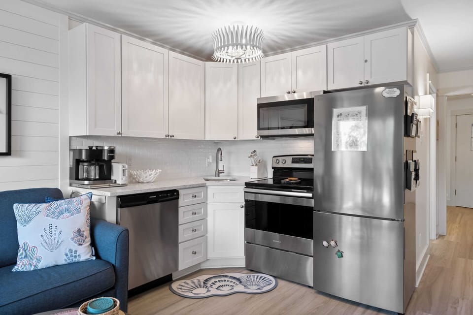 NEW upgrades with full size stailness steel appliances, tile, quartz and shiplap