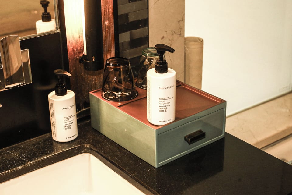 Separate tub and shower, rainfall showerhead, hair dryer, bathrobes