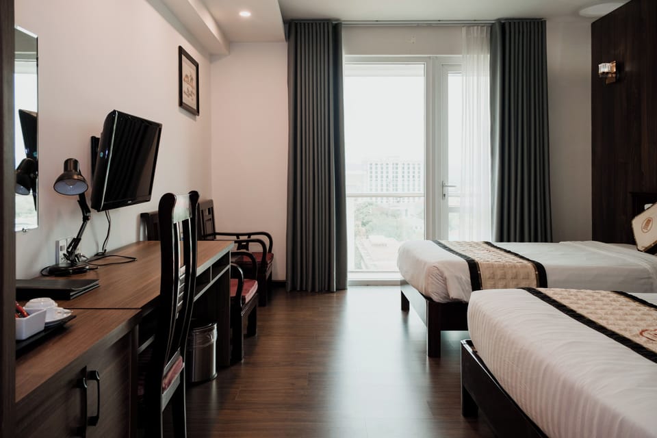 Deluxe Triple Room, River View | Desk, laptop workspace, free WiFi