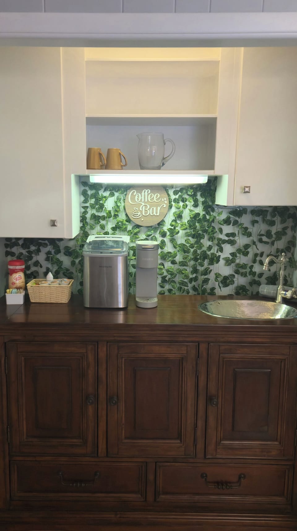 fully stocked coffee bar in master in law suite