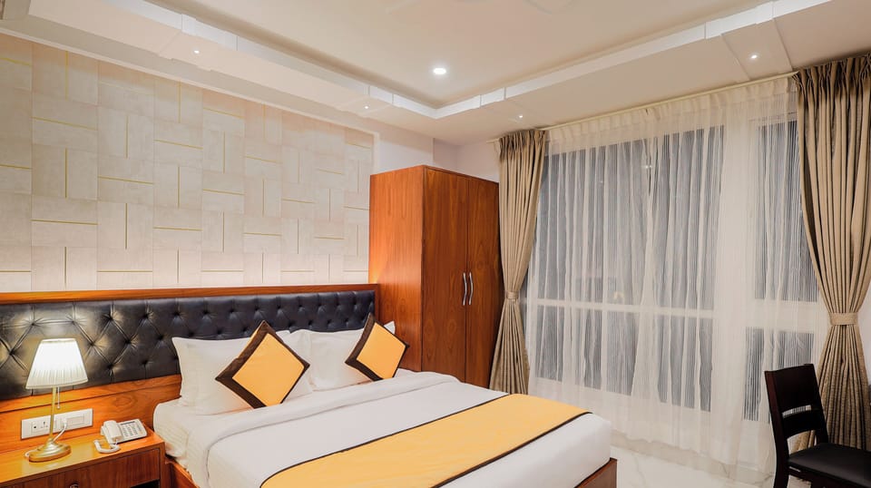 Deluxe Double Room, City View | Iron/ironing board, free WiFi, bed sheets