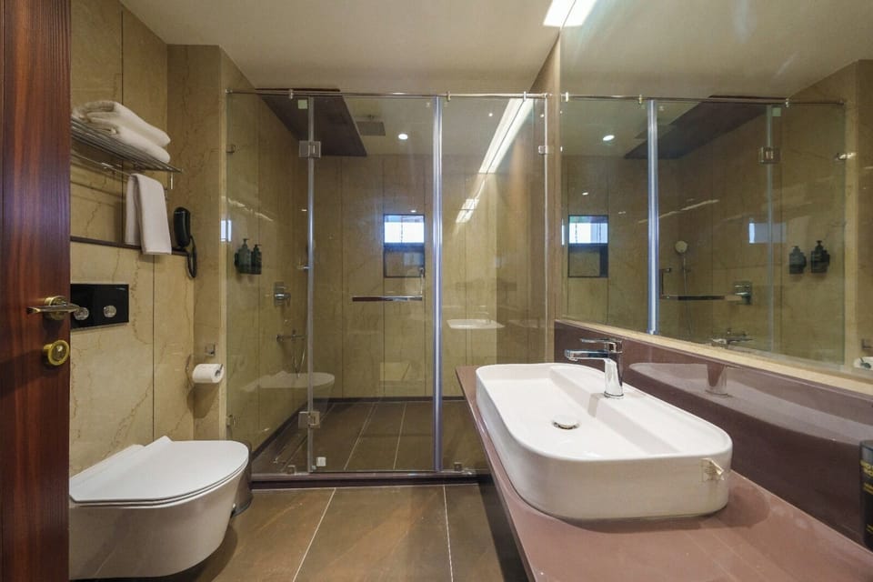Slippers, bidet, towels, soap