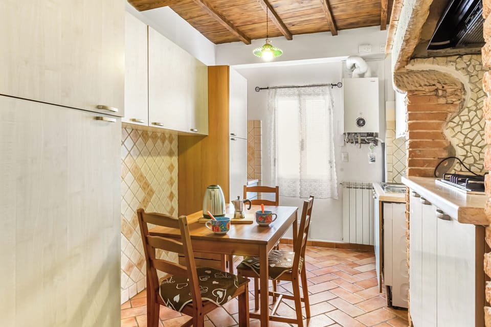 Fridge, electric kettle, toaster, cookware/dishes/utensils