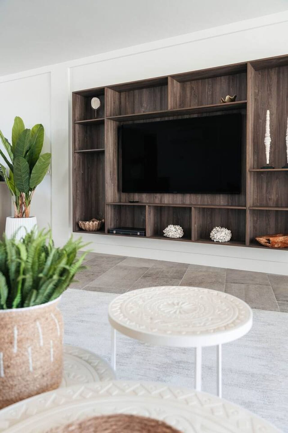 Cozy up in style with this sleek entertainment center! Perfect for movie nights or catching up on your favorite shows,