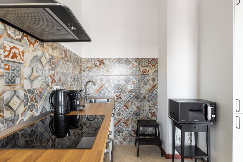 Apartment, 1 Double Bed with Sofa bed, City View | Private kitchen | Fridge, microwave, oven, stovetop