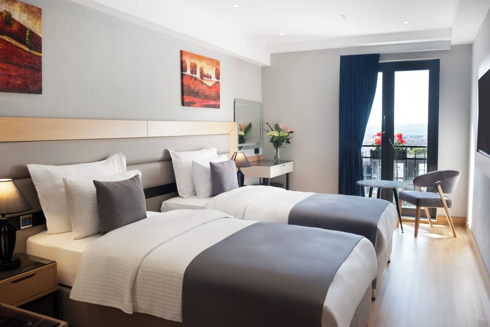 Standard Twin Room, City View | Premium bedding, in-room safe, soundproofing, free WiFi
