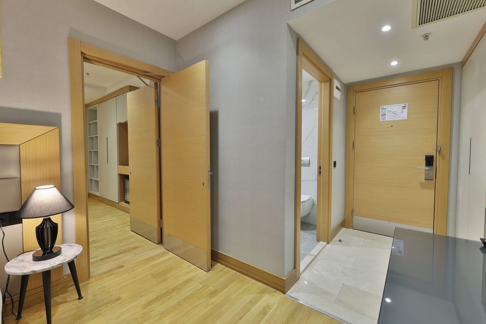 Family Quadruple Room, 2 Bedrooms, 2 Bathrooms | Living area | 80-cm LCD TV with cable channels