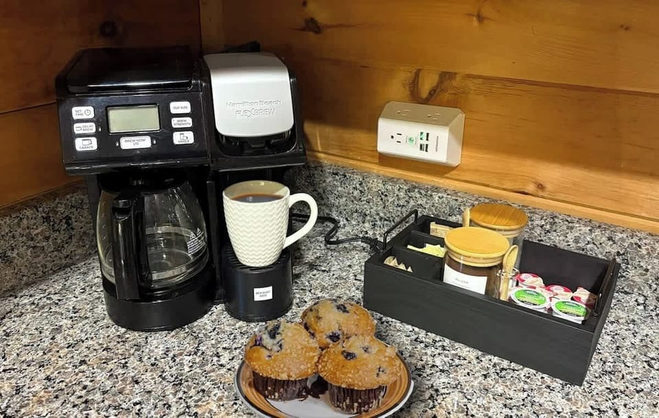 Enjoy a well-stocked coffee station w/ground coffee, K-cups, sweeteners & more.