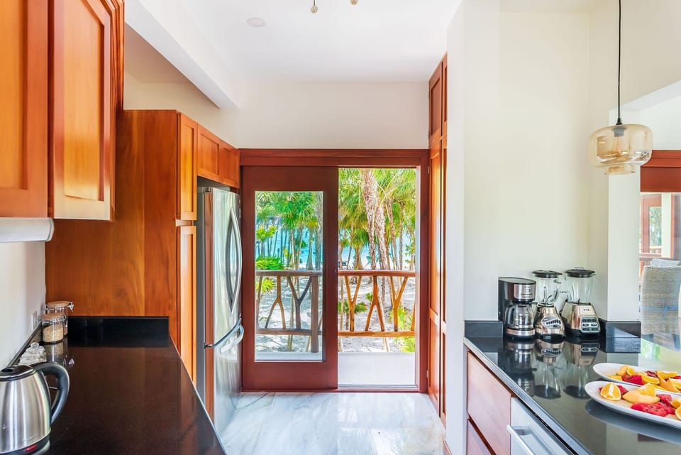 Luxury Villa | Private kitchen | Full-size fridge, microwave, oven, stovetop