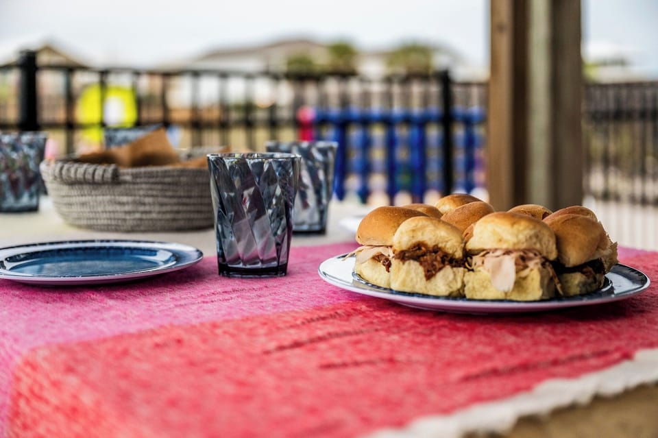 Sliders, sunshine, and good company, the perfect setup for an outdoor feast.