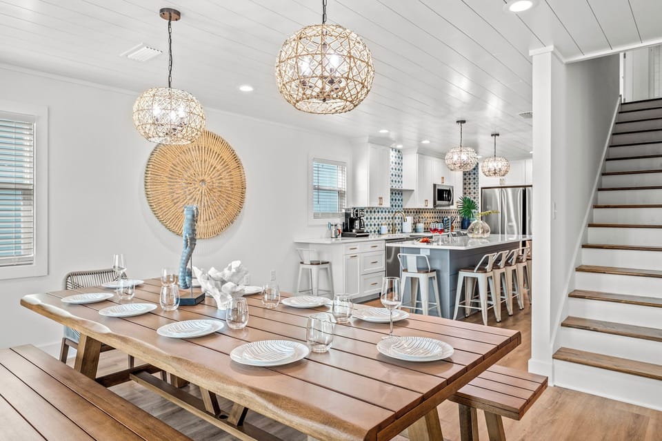 Gather around the table in this bright, inviting kitchen & dining space.