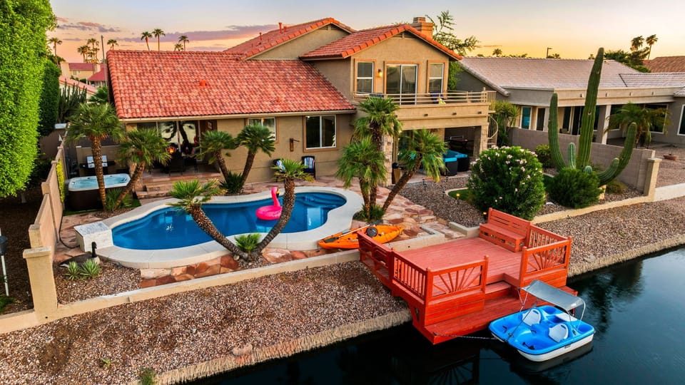 Backyard oasis with pool, spa, private dock & boats