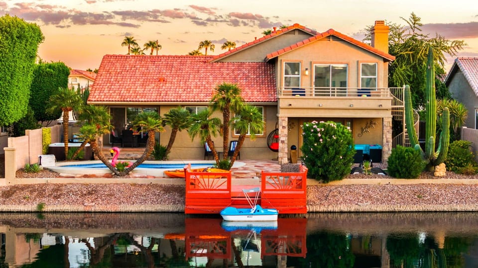 Lakefront home with pool, private dock & pedal boat