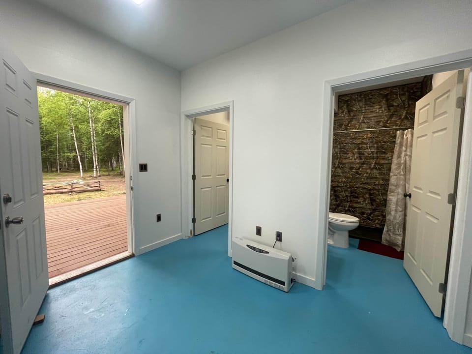 Shared bathroom and shower facilities.