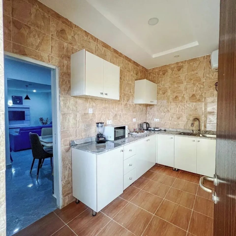 Luxury Apartment, Balcony, City View | Private kitchen | Fridge, microwave, oven, stovetop