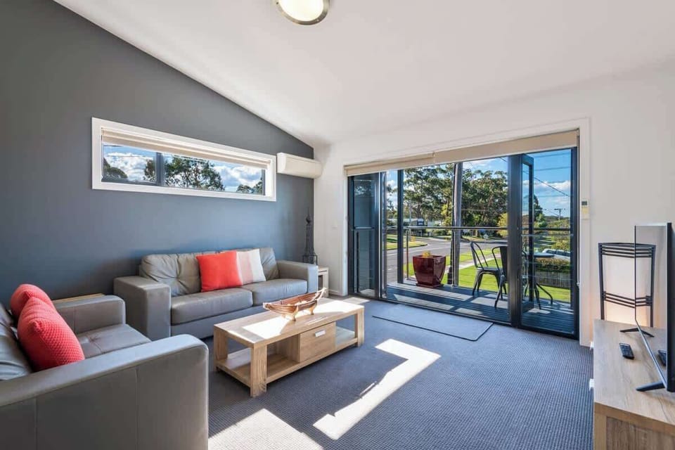 Lounge with North Facing Balcony in Nautilus's 'Orion' accommodation in Huskisson.