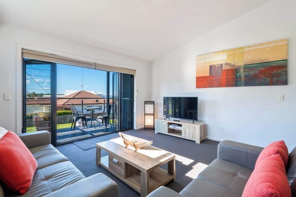 Lounge with North Facing Balcony in Nautilus Apartment's 'Orion' accommodation in Huskisson