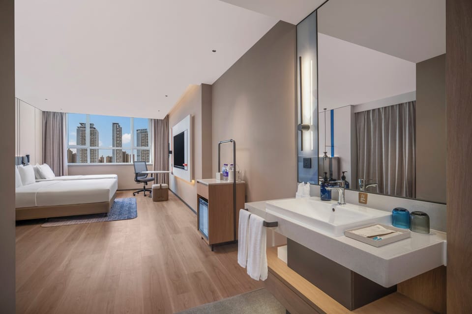 Premium bedding, down comforters, desk, laptop workspace