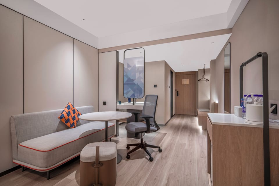 Premium bedding, down comforters, desk, laptop workspace